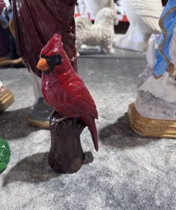 Cardinal on tree statue