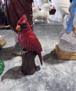 Cardinal on tree statue