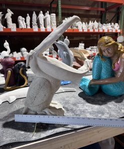 Pelican open mouth statue